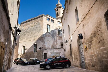 MONOPOLI, ITALY - JULY 4 2018: Carabinieri police cars stand in historical centre on July 4, 2018 in Monopoli, Italy.のeditorial素材