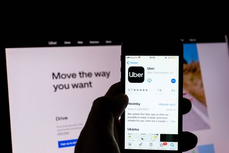 PRAGUE, CZECH REPUBLIC - NOVEMBER 21 2018: Uber company mobile app on phone screen with internet...