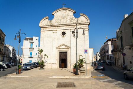 POLIGNANO A MARE, ITALY - JULY 6 2018: Church Chiesa della Trinita on July 6, 2018 in Polignano a Mare, Italy.のeditorial素材