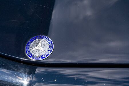 SAALBACH-HINTERGLEMM, AUSTRIA - JUNE 21 2018: Vintage dark blue Mercedes-Benz 230 SL oldsmobile...