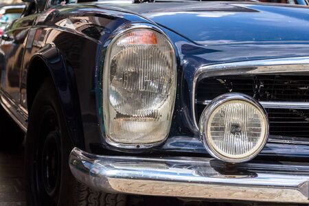 SAALBACH-HINTERGLEMM, AUSTRIA - JUNE 21 2018: Vintage dark blue Mercedes-Benz 230 SL oldsmobile veteran car standing on street on June 21, 2018 in Saalbach-Hinterglemm, Austria.のeditorial素材