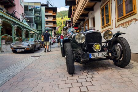 SAALBACH-HINTERGLEMM, AUSTRIA - JUNE 21 2018: Vintage Alvis oldsmobile veteran car standing on street on June 21, 2018 in Saalbach-Hinterglemm, Austria.のeditorial素材