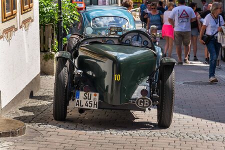SAALBACH-HINTERGLEMM, AUSTRIA - JUNE 21 2018: Vintage Alvis oldsmobile veteran car standing on street on June 21, 2018 in Saalbach-Hinterglemm, Austria.のeditorial素材