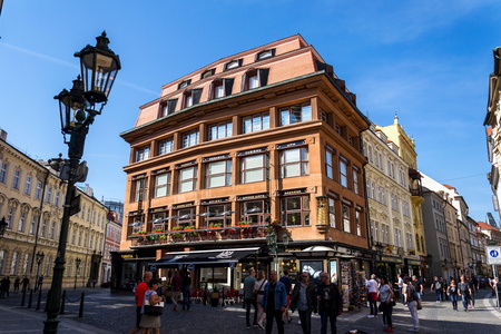 PRAGUE, CZECH REPUBLIC - APRIL 21 2018: Tourist walk around the cubist House of the Black Madonna designed by Josef Gocar in the Old Town on April 21, 2018 in Prague, Czech Republic.のeditorial素材