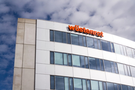 PRAGUE, CZECH REPUBLIC - MARCH 9 2018: Wustenrot Group company logo on headquarters building on March 9, 2018 in Prague, Czech Republic.のeditorial素材