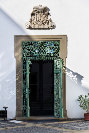 Decorative metal lattice doors at the Mikulov Castle in South Moravia, Czech Republic, sunny summer dayのeditorial素材