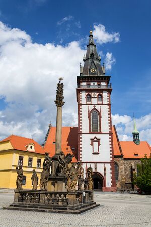Sightseeing tower of the late gothic decanal Church of the Assumption of the Virgin Mary in Chomutov, Usti nad Labem region, Krusne hory, Ore Mountains, Czech Republic, sunny summer day, clear blue sky backgroundの写真素材