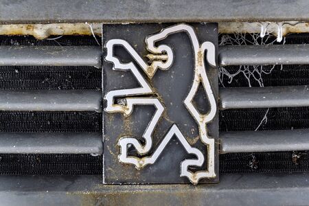 PRAGUE, CZECH REPUBLIC - JANUARY 26 2020: Peugeot company logo on old car on January 26, 2020 in Prague, Czech Republic.のeditorial素材