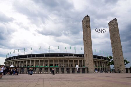 BERLIN, GERMANY - MAY 15 2018: People in front of the  stadium from 1936 on May 15, 2018 in Berlin, Germany.のeditorial素材