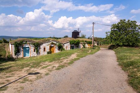 Traditional wooden windmill, Vrbice, Breclav district, Southern Moravia, Czech Republic, sunny summer dayの写真素材