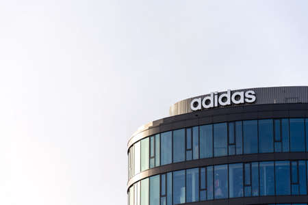 PRAGUE, CZECH REPUBLIC - MARCH 5 2020: Sportswear manufacturer Adidas company logo on headquarters buildign on March 5, 2020 in Prague, Czech Republic.のeditorial素材