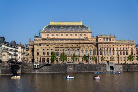Prague panorama with National Theatre on the bank of Vltava River, Prague, Czech Republic, sunny summer dayの写真素材
