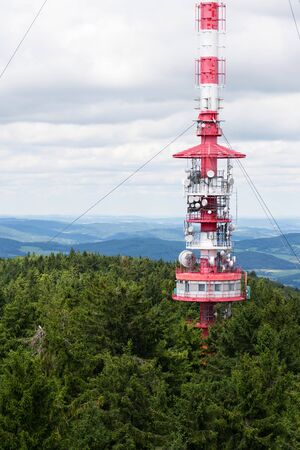 Telecommunication tower with transmitters and aerials, wireless communication and internet traffic increase conceptTelecommunication tower with transmitters and aerials, wireless communication and internet traffic increase conceptの写真素材