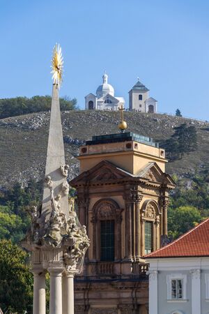 The Dietrichstein Tomb cultural monument with Church of St. Anne, nature preserve Holy Hill with Chapel of Saint Sebastian and Bell Tower, Mikulov, Moravia, Czech Republic, sunny summer dayの写真素材