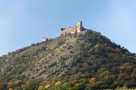 Devicky castle ruins overlooking banks of Nove Mlyny water reservoir near Pavlov, South Moravia, Czech Republic, sunny summer dayの写真素材