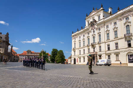 PRAGUE, CZECH REPUBLIC - JUNE 2 2020: Face masks on soldiers in front of the Prague Castle during Changing of the Guard, coronavirus covid-19 pandemic outbreak on June 2, 2020 in Prague, Czech republic.のeditorial素材