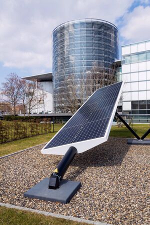 Blue rotating solar panels tilted axis tracker, future innovation energy conceptの写真素材