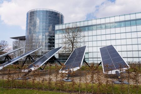 Blue rotating solar panels tilted axis tracker, future innovation energy conceptの写真素材