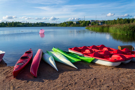 Toolonlahti sea bay with small beach for recreational sports near Olympic stadium and Linnanmaki amusement park, Helsinki, Finlandの写真素材