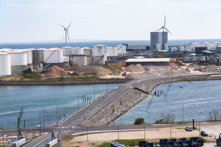 Wind turbines in Copenhagen port with the Oresund bridge in the background, Denmark