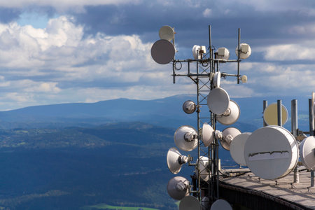 Bunch of transmitters and aerials on telecommunication tower