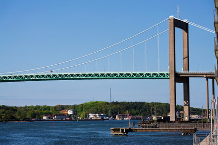 Suspension Alvsborg bridge over Gota river connecting Hisingen island with mainland near Eriksberg and Majorna area in Gothenburg, Sweden, sunny summer dayの写真素材