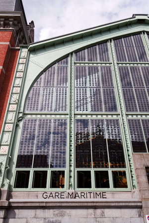 Solar panels integrated into windows on the facade of the Gare Maritime former railway station on the Tour and Taxis site in Brussels, Belgiumの写真素材