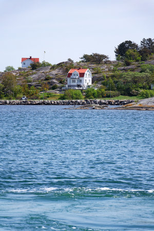 Houses around marina in Donso island, Southern Gothenburg archipelago, Gothenburg municipality, Vastra Gotaland County, Swedenの写真素材