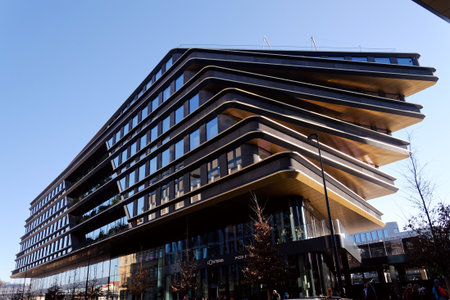 Masarycka MSD Masaryk Station Development office and retail building by Zaha Hadid Architects with golden facade on November 19, 2025 in Prague, Czech Republic.のeditorial素材