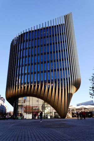 Masarycka MSD Masaryk Station Development office and retail building by Zaha Hadid Architects with golden facade on November 19, 2025 in Prague, Czech Republic.のeditorial素材