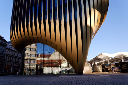 Masarycka MSD Masaryk Station Development office and retail building by Zaha Hadid Architects with golden facade on November 19, 2025 in Prague, Czech Republic.のeditorial素材