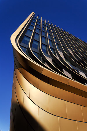 Masarycka MSD Masaryk Station Development office and retail building by Zaha Hadid Architects with golden facade on November 19, 2025 in Prague, Czech Republic.のeditorial素材