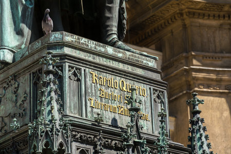 Monumental neo-Gothic statue of Emperor Charles IV from 1844 holding a sword and university charters, Krizovnicke square on the foot of the Charles bridge, Prague, Czech republicの写真素材