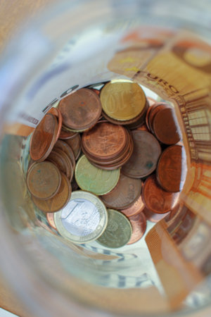 my savings in a glass jarの写真素材