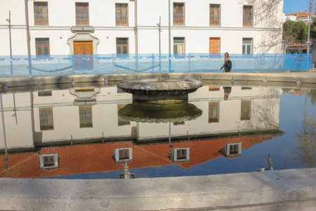 reflection of a building in a pond in Madridの写真素材