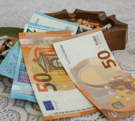 euro bills to put our health at risk with tobaccoの写真素材