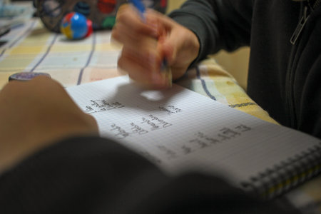 young scholar engaged in homework after school