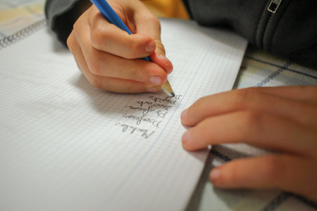 Education in Action: Kid Doing Homeworkの写真素材
