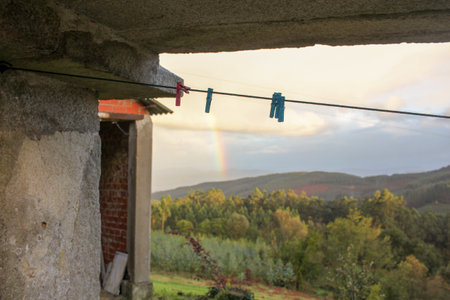 Nature's Palette: Vibrant Rainbow Gracing the Mountain Landscapeの写真素材