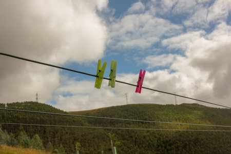 clothesline in the mountains with clothespins