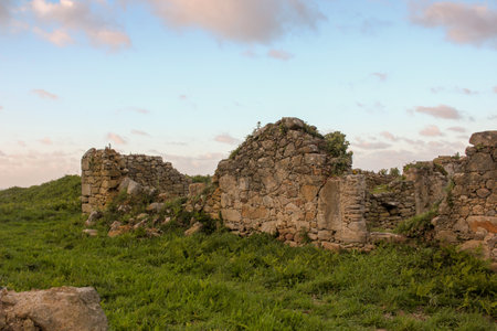San Tirso ruins in Xove, Spain, at sunsetの写真素材