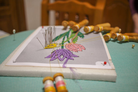 the work of an elderly woman with thread at homeの写真素材