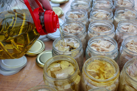 artisan way to preserve tuna in olive oil in Burela, Spainの写真素材