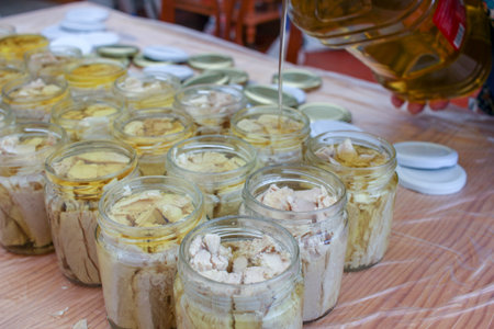 bonito with olive oil to preserve it in jars