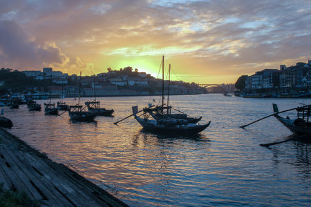 small boats in Douro river. Porto. Portugal at sunsetの写真素材