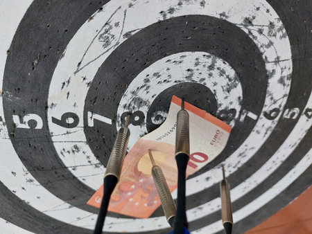 Ten euros at the bullseye, representing a small investment with precise and profitable results