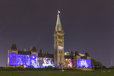 Canada's Parliament buildings lit up at nightのeditorial素材