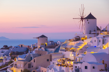 Oia Sunset, windmills, Santorini island, Greeceの写真素材