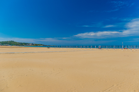 Golden sand beach of Vieste, sunny day, Gargano peninsula, Apulia, South of Italyの写真素材