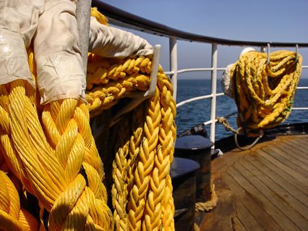 closeup of a yellow rope on a boatの写真素材